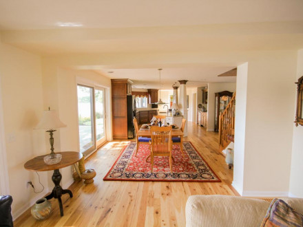 View After from Family Room to Dining and beyond into addition