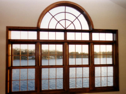 Round top window looking out to lake
