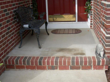 Brick accent on front step inspired the makeover
